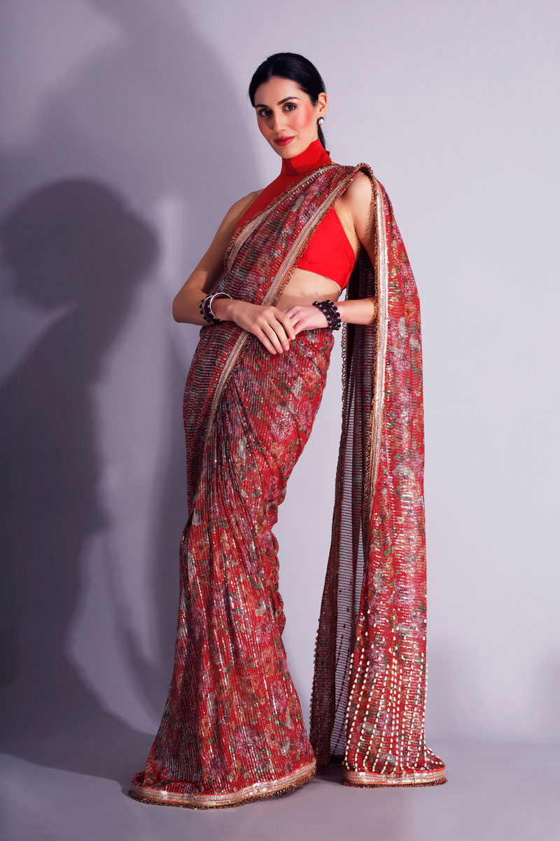 Gul floral Sequin saree with Pearl hand embroidered Pallu end.